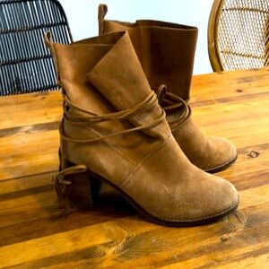 Toms brand “Mila” leather boots with wrap around laces